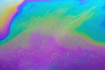 Abstract background texture of iridescent paints. Soap bubble