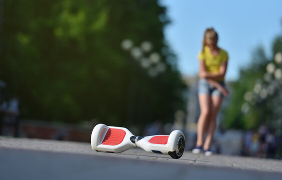 Girl Child Injured Her Elbow While Falling Off A Hoverboard While Riding In A Park