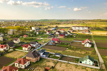Fototapeta na wymiar Aerial view of rural area in town with residential houses