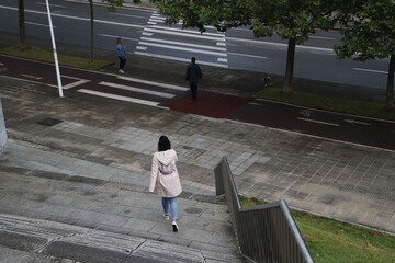 Girl crossing the street