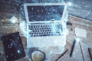 Multi exposure of brain sketch hologram over topview work table background with computer. Concept...