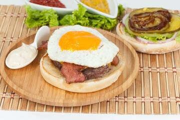 Tasty American Burger With Meat Egg And Bacon.