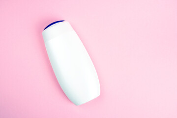 Cosmetic tube mock up isolated on pink background. Lotion skin care bottle template. Beauty concept.