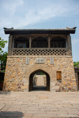 Fototapeta na wymiar Historical asian temple with chinese ieroglifs on it