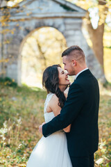 Fototapeta premium Bride and groom at a photo session in the nature