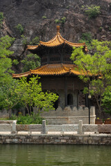 Asian historical temple on the bank of a river