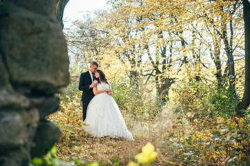 bride and groom in autumn park Love Life