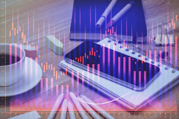 Double exposure of forex chart drawing and cell phone background. Concept of financial trading