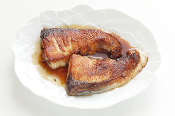 Japanese food, pan fried yellow tail Buri fish served soy sauce