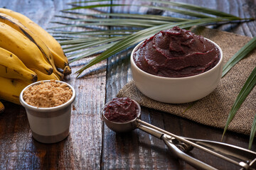 Acai bowl with fruit on table wooden