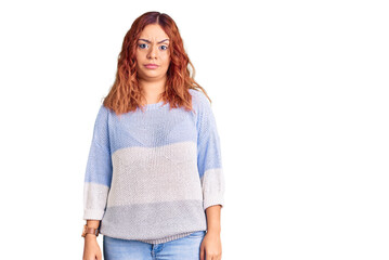 Young latin woman wearing casual clothes skeptic and nervous, frowning upset because of problem....