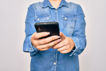 Young caucasian woman having conversation using smartphone over isolated white background