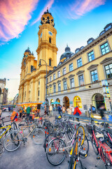 Obraz premium Picturesque autumn cityscape and view on Theatine Church of St. Kajetan or Theatinerkirche in Munich