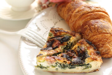 homemade quiche and croissant for gourmet bunch