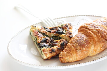 homemade quiche and croissant for gourmet bunch