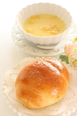 Fototapeta premium homemade butter roll on white dish with copy space