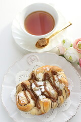 Homemade caramel and chocolate bun with copy space