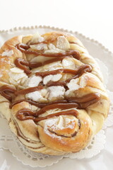 Homemade caramel and chocolate bun with copy space