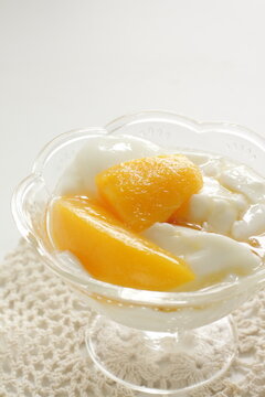 Canned Food, Mango And Syrup In White Bowl