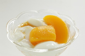 Canned mango and fermentation on white background