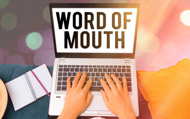 Conceptual hand writing showing Word Of Mouth. Concept meaning information that is transmitted...