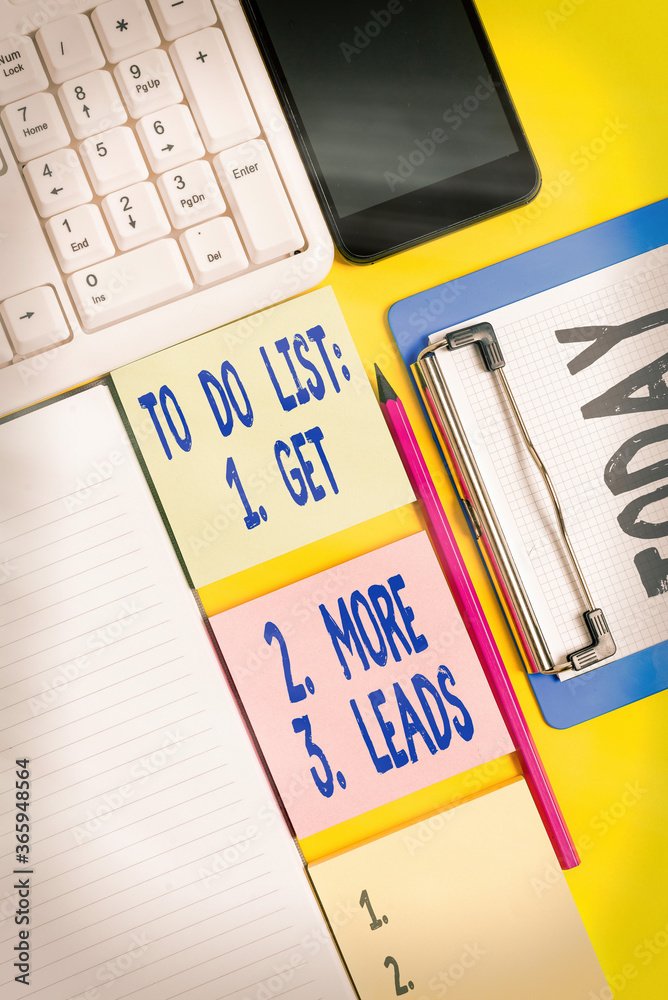 Fototapete Writing note showing To Do List: 1. Get 2. More 3. Leads. Business concept for advertising plan to attract clients Empty papers with copy space on yellow background table