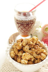nut and caramel popcorn in bowl for snack food