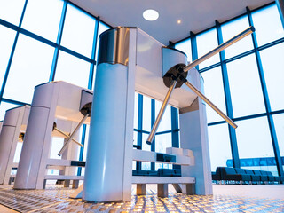 A number of turnstiles in the building. Turnstiles on the background of the waiting room with...