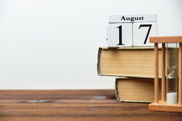 17th august - seventeenth day month calendar concept on wooden blocks with copy space.