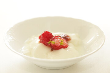 Strawberry Jam and nut on Yogurt for healthy breakfast