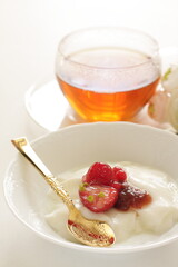 Strawberry Jam and nut on Yogurt for healthy breakfast