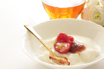 Strawberry Jam and nut on Yogurt for healthy breakfast
