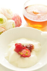 Strawberry Jam and nut on Yogurt for healthy breakfast