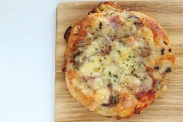 homemade cheese and mushroom bacon pizza