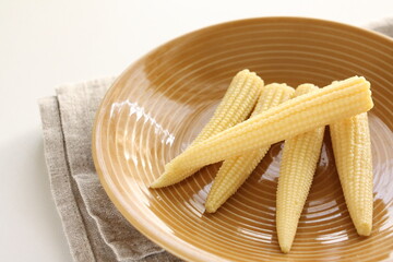 baby corn on dish with copy space