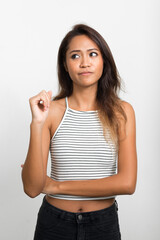 Portrait of young beautiful Asian woman with brown hair