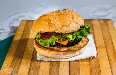 hamburger on a wooden table