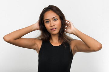 Fototapeta premium Portrait of young beautiful Asian woman with brown hair