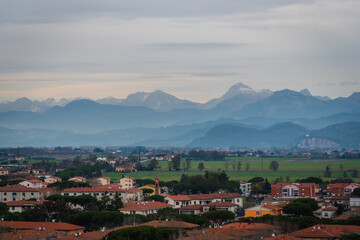 Fototapeta na wymiar city with mountains pisa italy