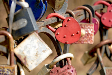 Locks on the railing of the bridge a symbol of love and fidelity