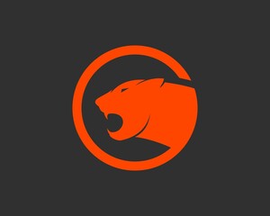 Orange circle shape with panther inside © DitaTiara