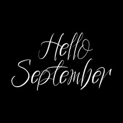 Hello September brush paint hand drawn  lettering on black background. Design  templates for greeting cards, overlays, posters