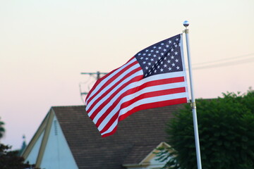 american flag on a wind