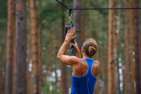 City Riga, Latvia. Run race, people were engaged in sports activities. Overcoming various obstacles and running.