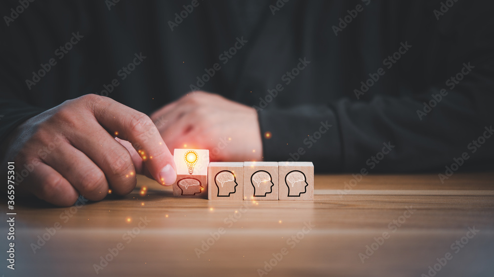 Poster creative idea.concept of idea and innovation. hand of business man flips one revealing an idea from 
