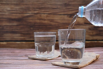 Glasses of water on the table background and space for text 