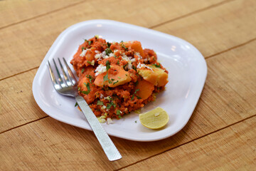 Rava Idli sambar or Idli with Sambar and green, red chutney. Popular South indian breakfast