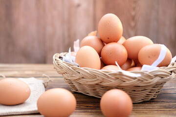 eggs on wood table background and space for text