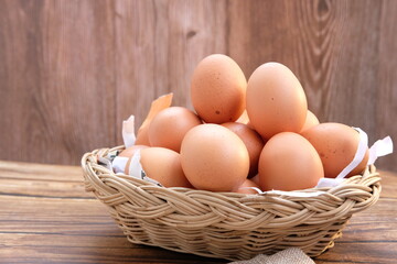 eggs on wood table background and space for text