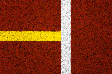 Red stadium running track closeup